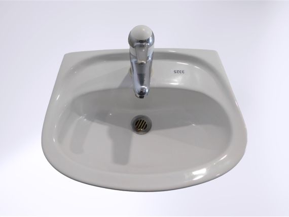 Lavabo Laufen mit Armatur